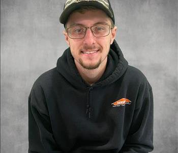 Man wearing a SERVPRO hoodie